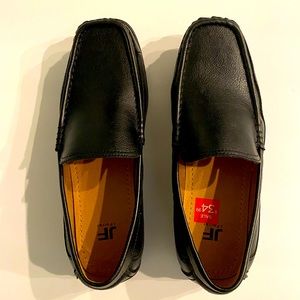 Men’s black loafers.